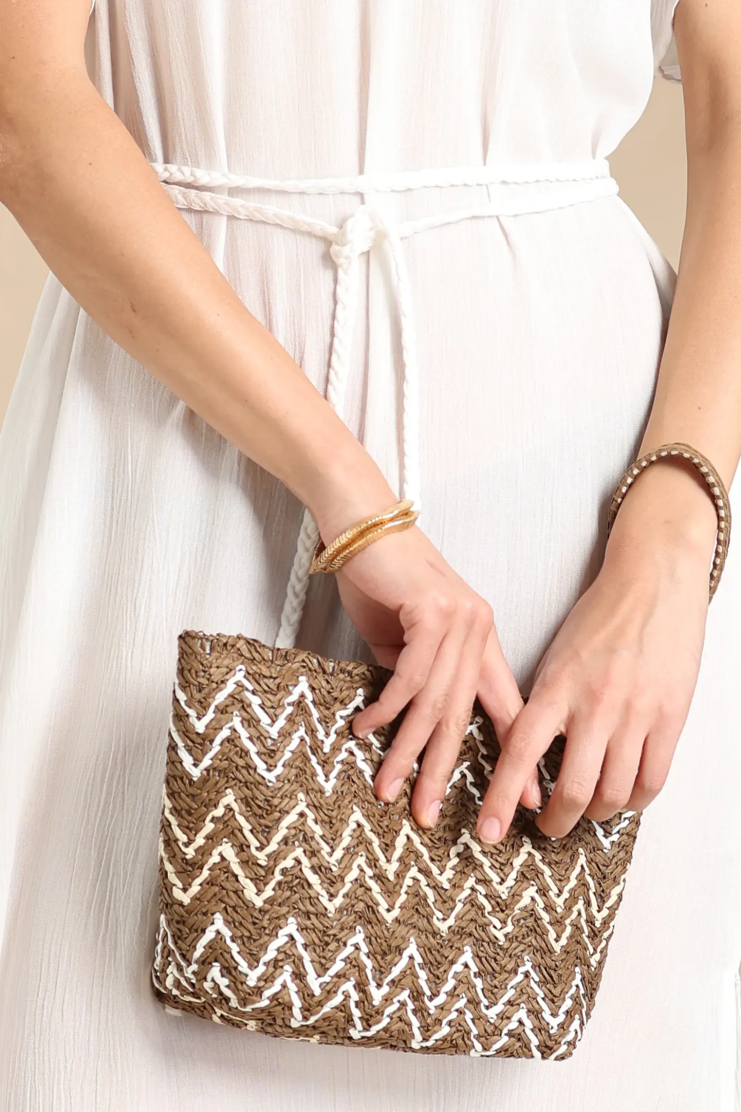 Pochette con chiusura zip zig zag
